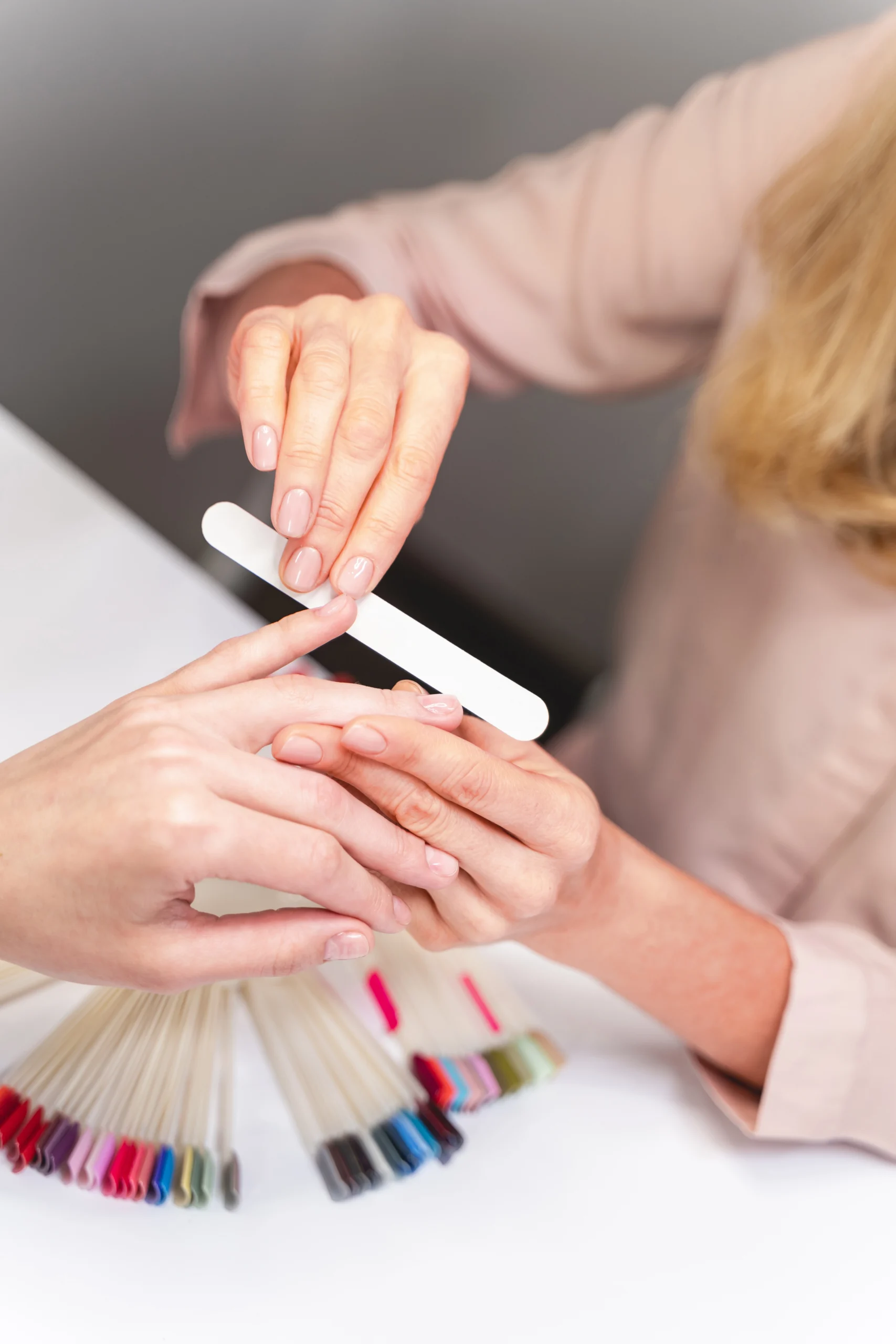 Professional manicure service session in a cozy salon.
